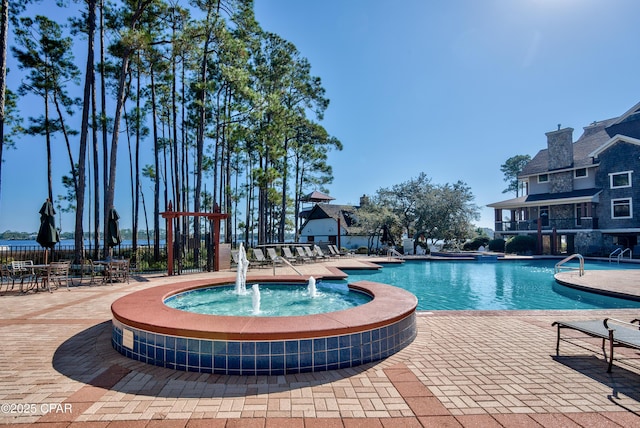 22207 Fox Glenn Trce, Panama City Beach, FL 32413 - community pool featuring fence and a patio