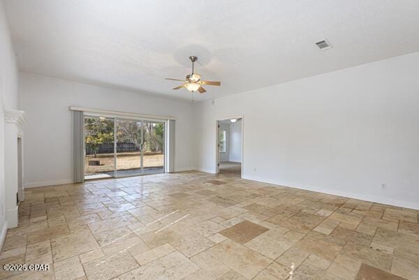 empty room featuring ceiling fan