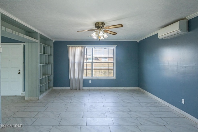 empty room with built in shelves, a wall mounted air conditioner, a textured ceiling, ornamental molding, and ceiling fan