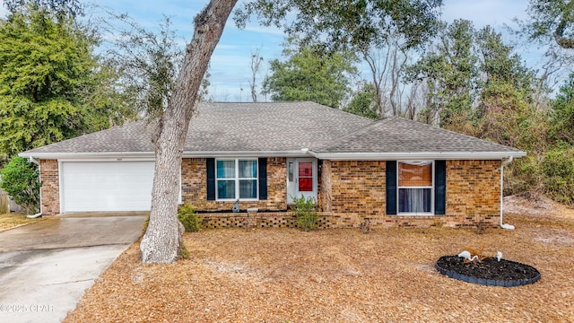 ranch-style house featuring a garage