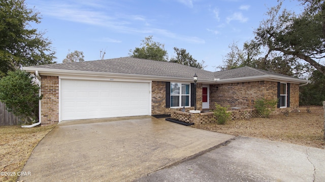 ranch-style home with a garage