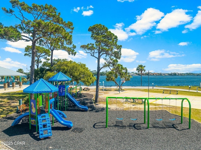 view of jungle gym with a water view