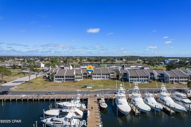 aerial view featuring a water view and a residential view