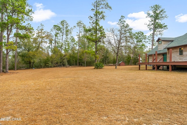 view of yard with a deck