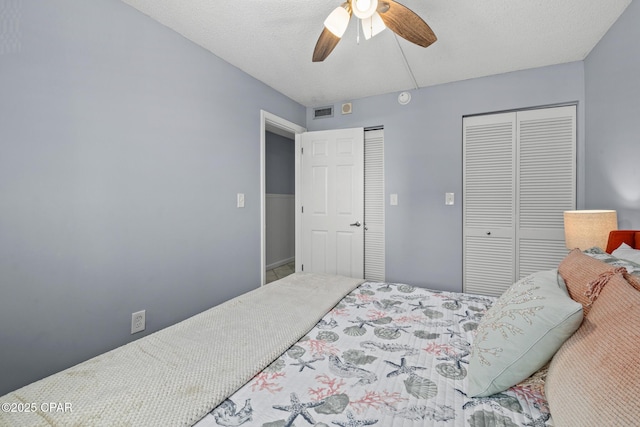 5801 Thomas Dr Unit 601, Panama City Beach, FL 32408 - bedroom with two closets, visible vents, and ceiling fan