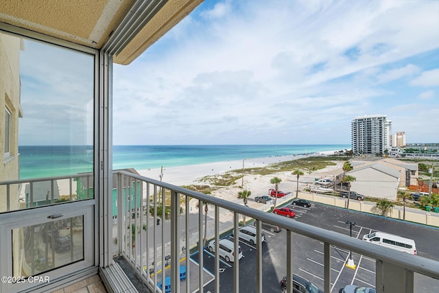 5801 Thomas Dr Unit 601, Panama City Beach, FL 32408 - balcony featuring a view of the beach and a water view