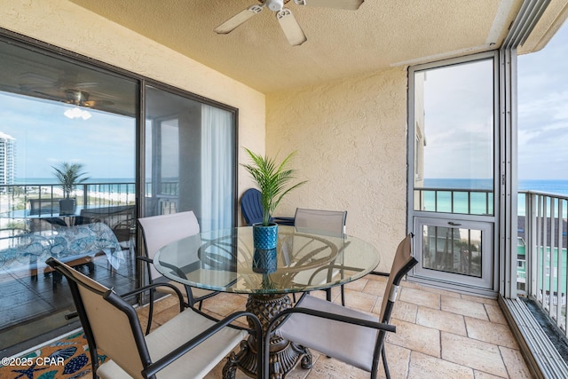 5801 Thomas Dr Unit 601, Panama City Beach, FL 32408 - sunroom / solarium with a textured wall, a textured ceiling, and plenty of natural light