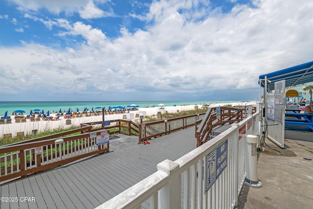 5801 Thomas Dr Unit 601, Panama City Beach, FL 32408 - deck featuring a beach view and a water view