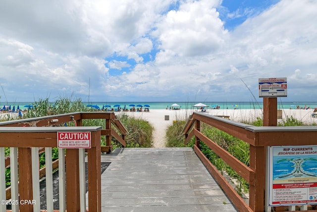 5801 Thomas Dr Unit 601, Panama City Beach, FL 32408 - view of home's community featuring a view of the beach and a deck with water view