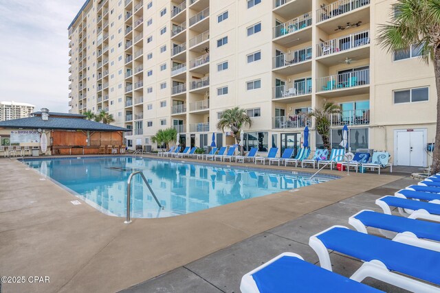 5801 Thomas Dr Unit 601, Panama City Beach, FL 32408 - community pool featuring ceiling fan