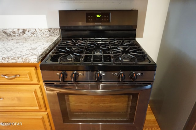 details featuring stainless steel range with gas cooktop