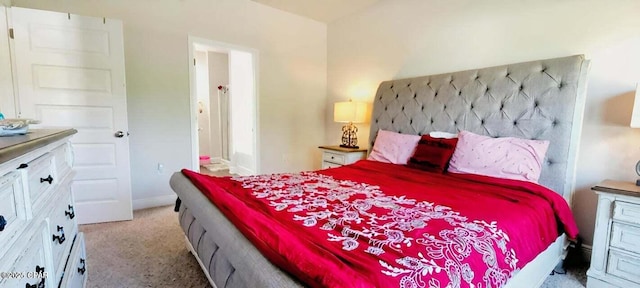 bedroom featuring light colored carpet