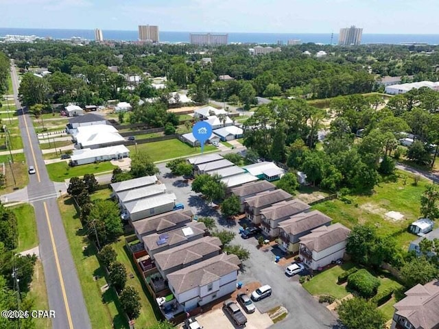 birds eye view of property with a view of city