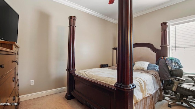 bedroom featuring light carpet, baseboards, and ornamental molding