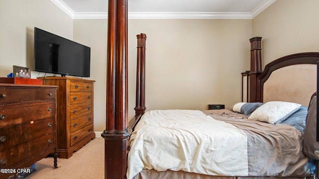 bedroom featuring ornamental molding and light carpet