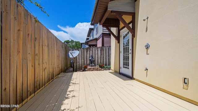 deck featuring a fenced backyard