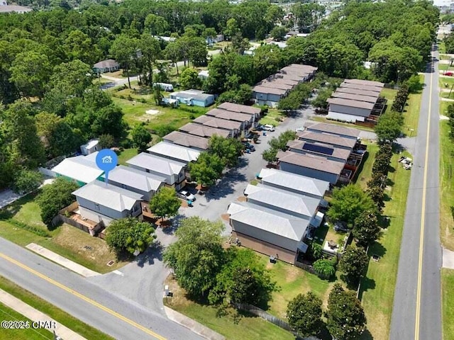 birds eye view of property with a residential view