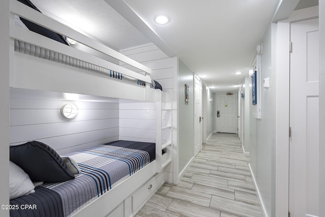 bedroom with baseboards and recessed lighting