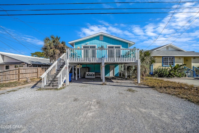 view of front of home with a carport