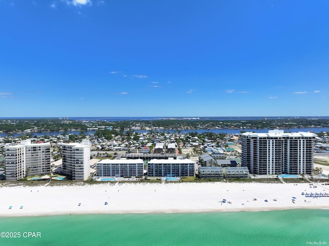 bird's eye view with a beach view and a water view