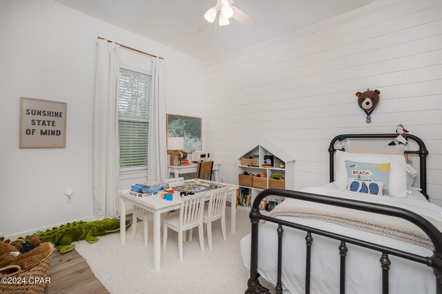 bedroom featuring wood finished floors