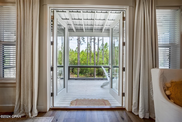 doorway to outside with hardwood / wood-style flooring