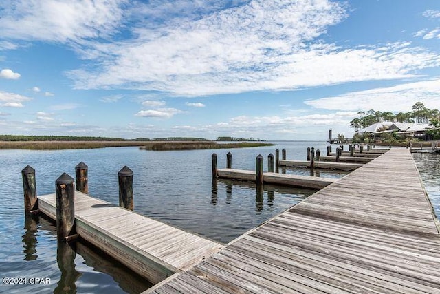 view of dock with a water view