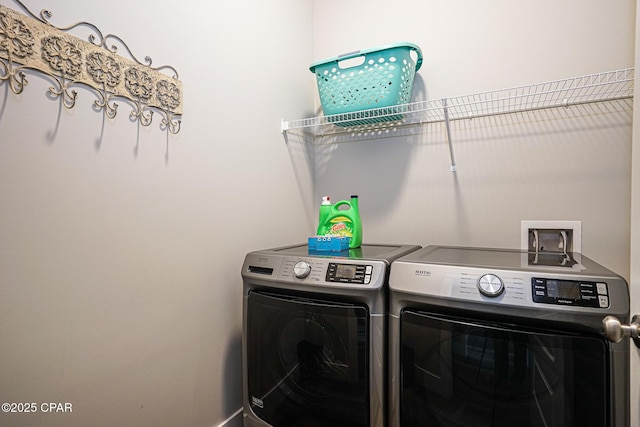 laundry room with laundry area and washer and dryer