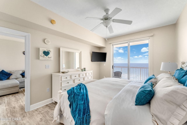 bedroom with ceiling fan, light wood-type flooring, and access to outside