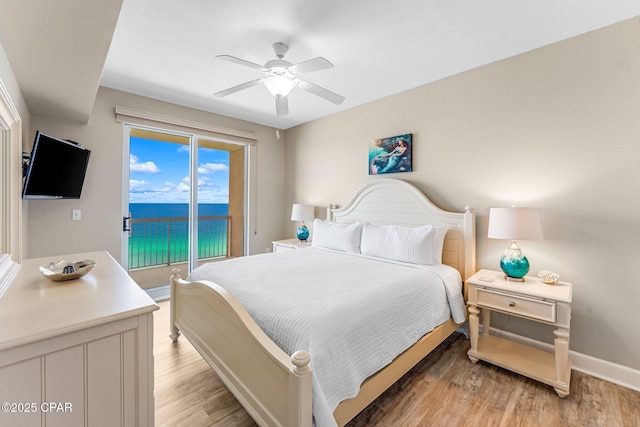 bedroom with ceiling fan, access to exterior, and light hardwood / wood-style floors