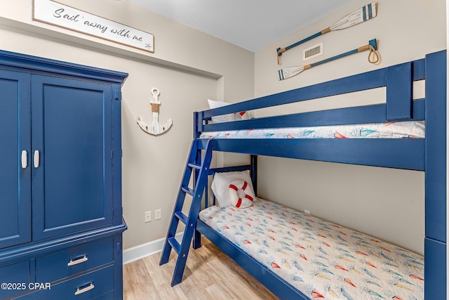 unfurnished bedroom with light hardwood / wood-style flooring