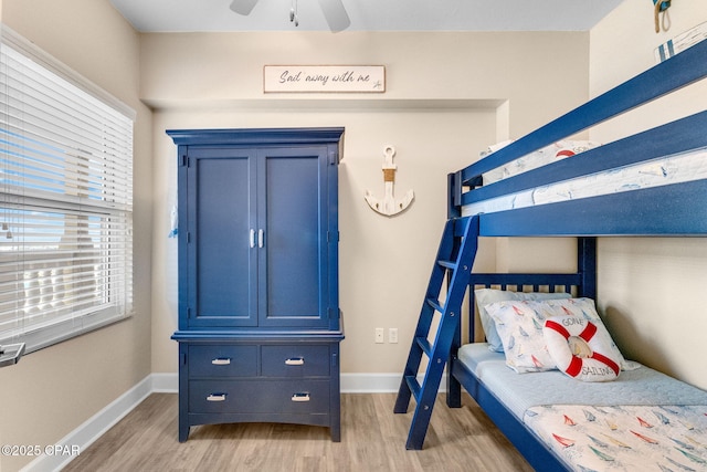 bedroom featuring ceiling fan and light hardwood / wood-style floors