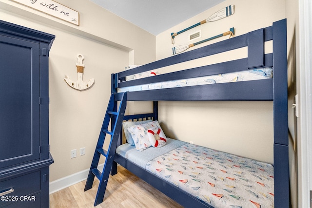bedroom featuring light wood-type flooring