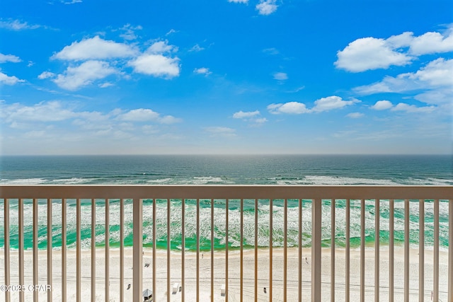 view of water feature with a beach view