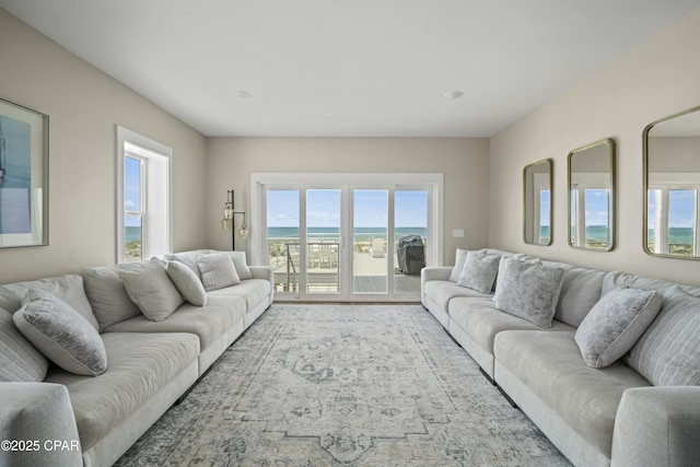 living room featuring a water view