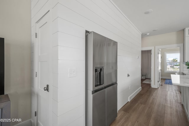 corridor with dark hardwood / wood-style floors