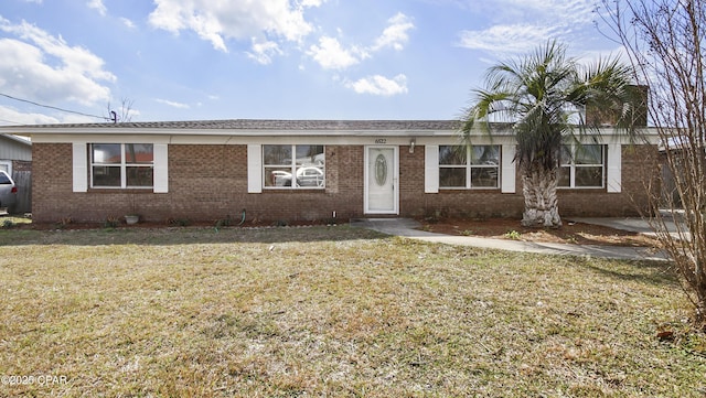 ranch-style house with a front lawn