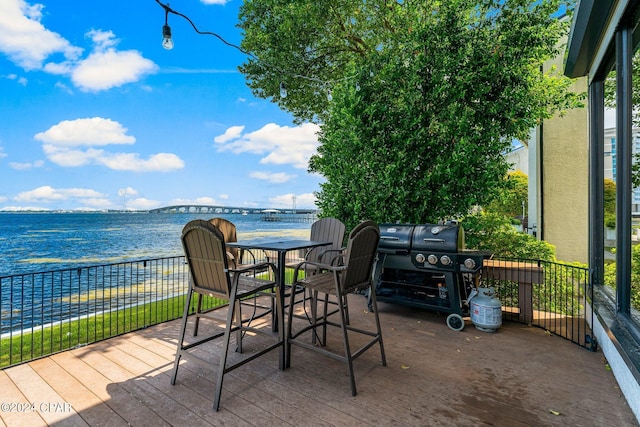 view of patio featuring a water view