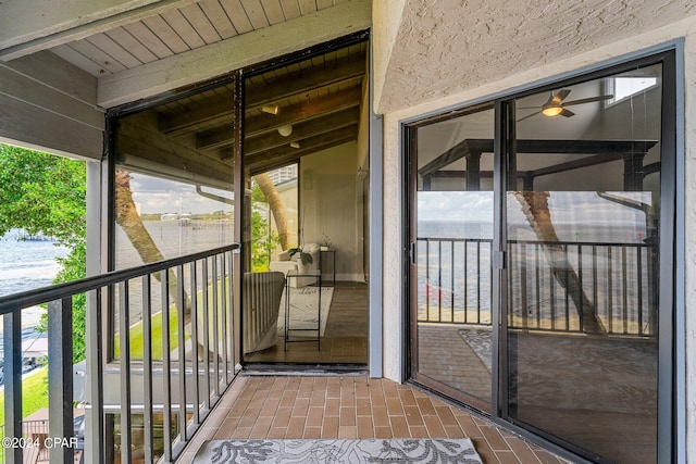 doorway to property featuring a balcony