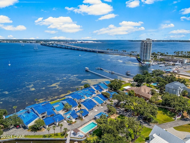 birds eye view of property with a water view