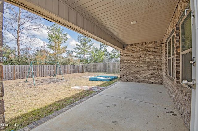 view of patio with a playground