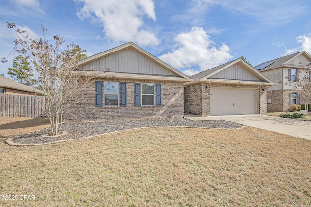 view of front facade featuring a garage and a front lawn