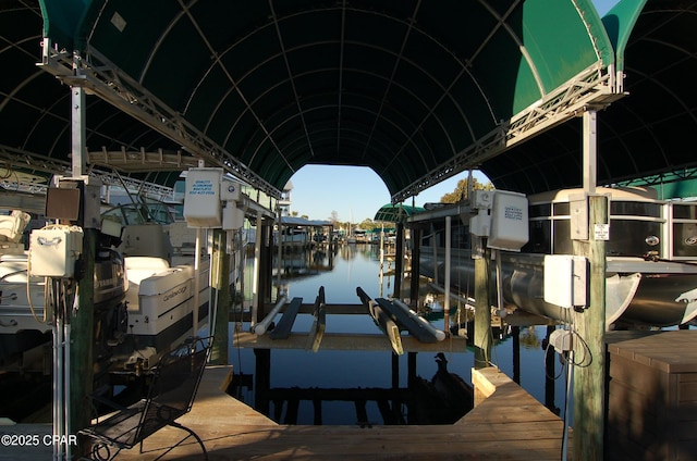 view of dock with a water view