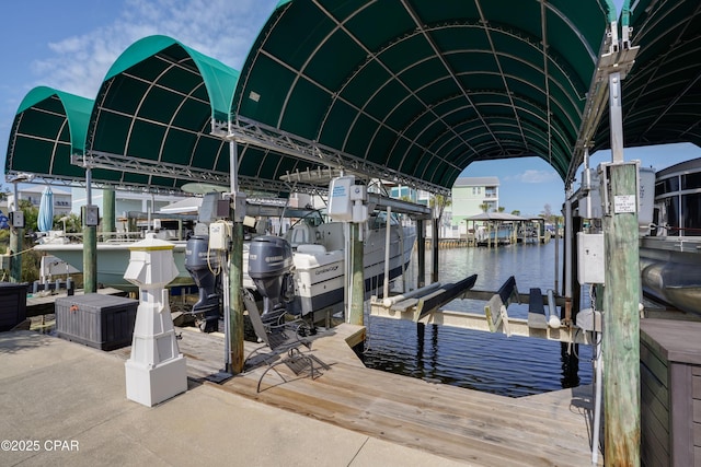 view of dock with a water view and boat lift