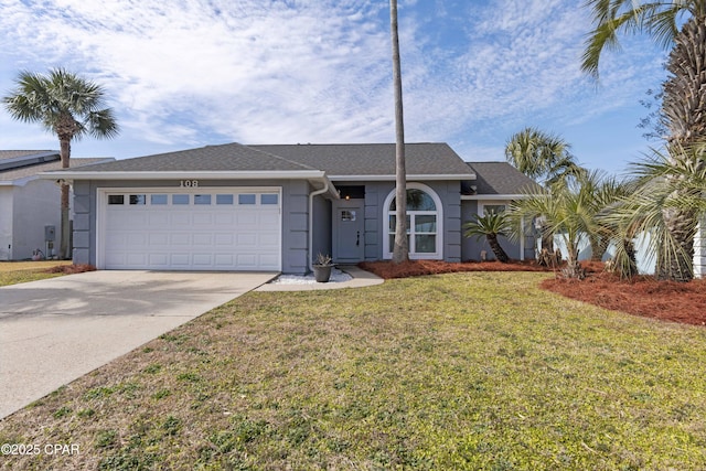 single story home with a garage and a front yard