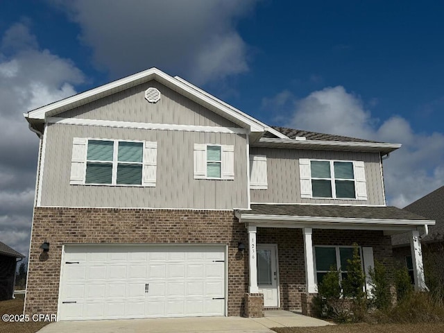 view of front of property featuring a garage