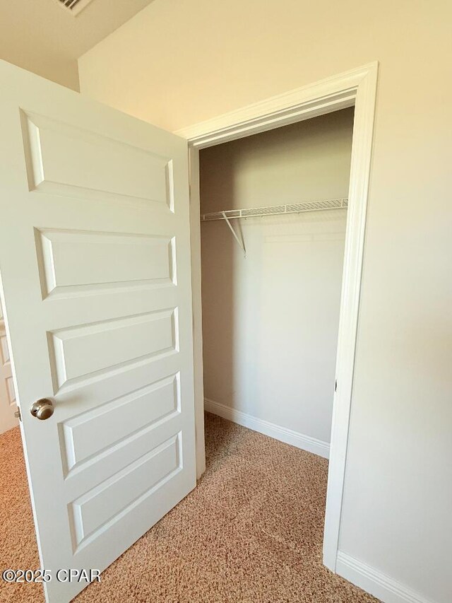 bathroom with hardwood / wood-style floors,  shower combination, and toilet