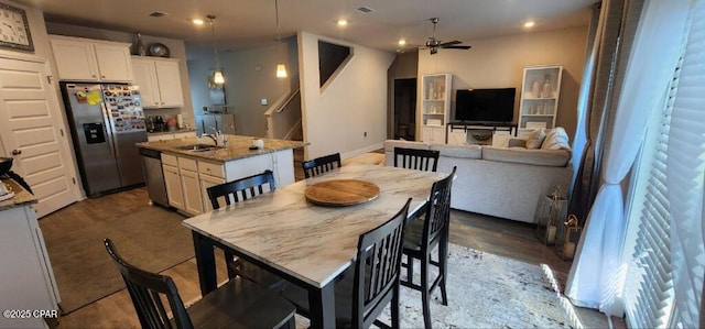 dining area with ceiling fan, visible vents, and recessed lighting