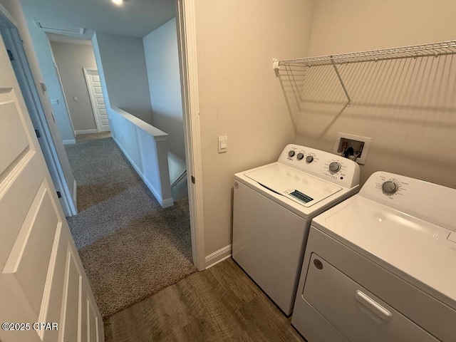 laundry area with laundry area, baseboards, dark wood finished floors, and independent washer and dryer