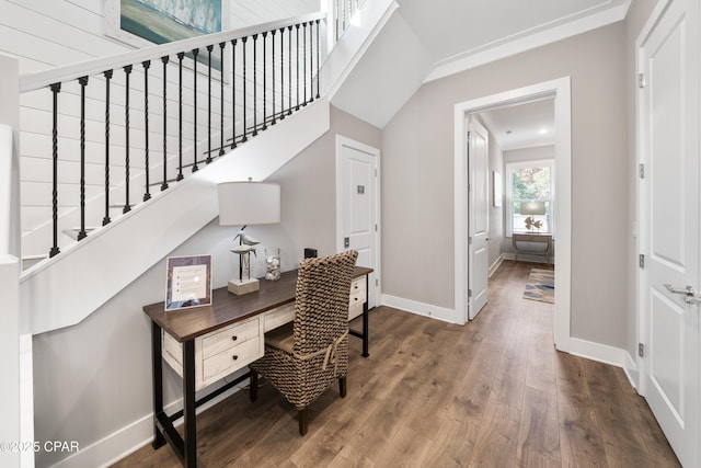 office space featuring baseboards and wood finished floors